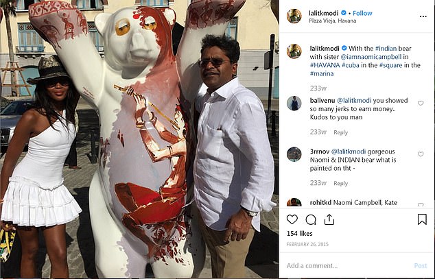 Campbell with millionaire cricket tycoon Lalit Modi in Havana, who is wanted in India for corruption. He reportedly took millions of rupees in kickbacks