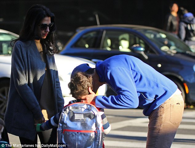 Saying goodbye: The now-incarcerated Weiner was spotted giving his son a kiss before sending his ex-wife and child on